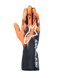 Guanti Alpinestars Tech-1 K V3, guanti da karting, nero arancione e bianco, con design grafico sublimato a pennellate arancioni su base nera, grande logo Astar bianco sul dorso e scritta Alpinestars verticale sul polsino, attrezzatura professionale da kart