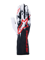 Guanti Alpinestars Tech-1 K V3, guanti da kart, nero bianco rosso, con design grafico a macchie bianco e nero sul dorso, grande logo Alpinestars rosso, branding rosso sul polsino lungo, attrezzatura professionale per motorsport