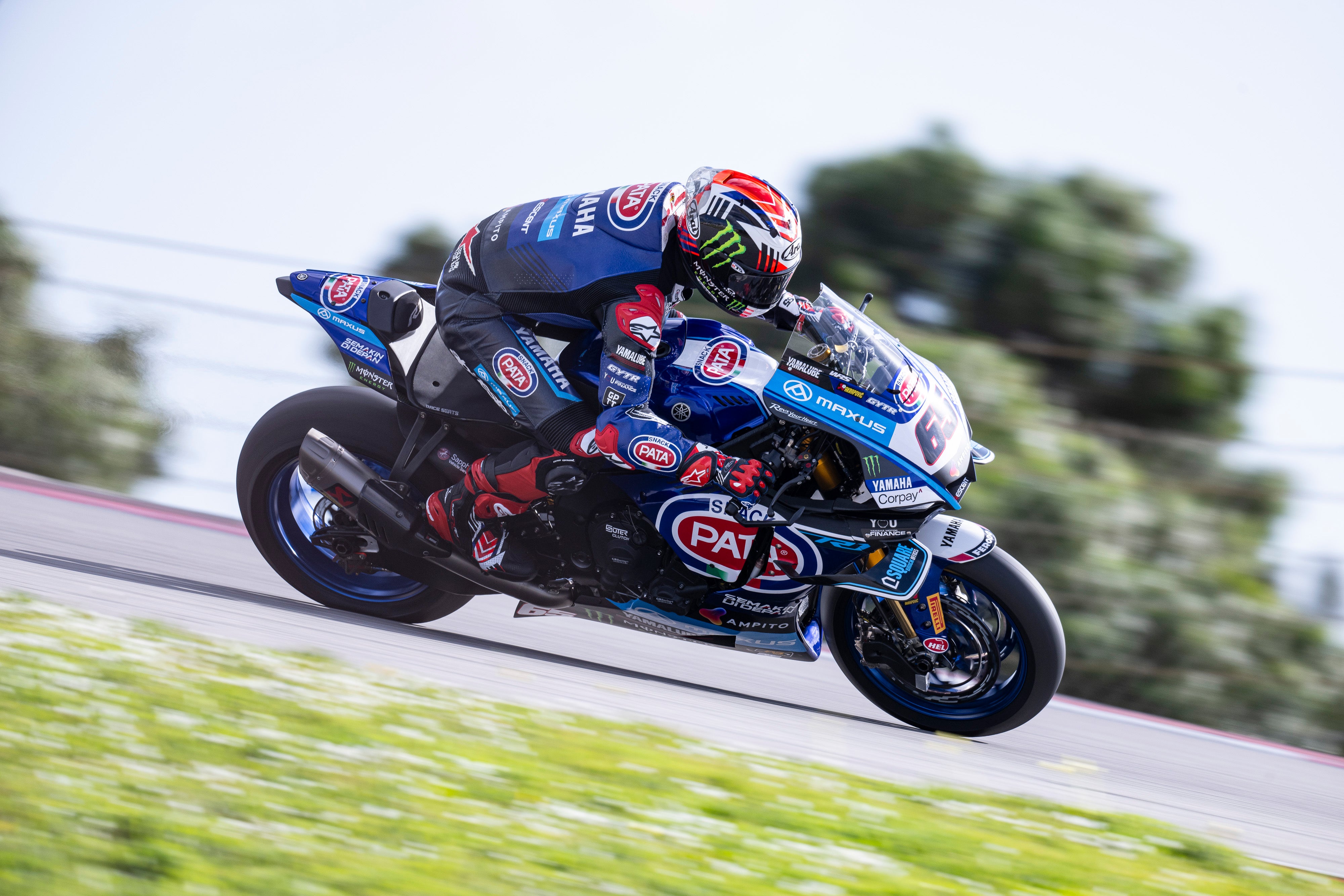 Jonathan Rea racing on a track with blurred background