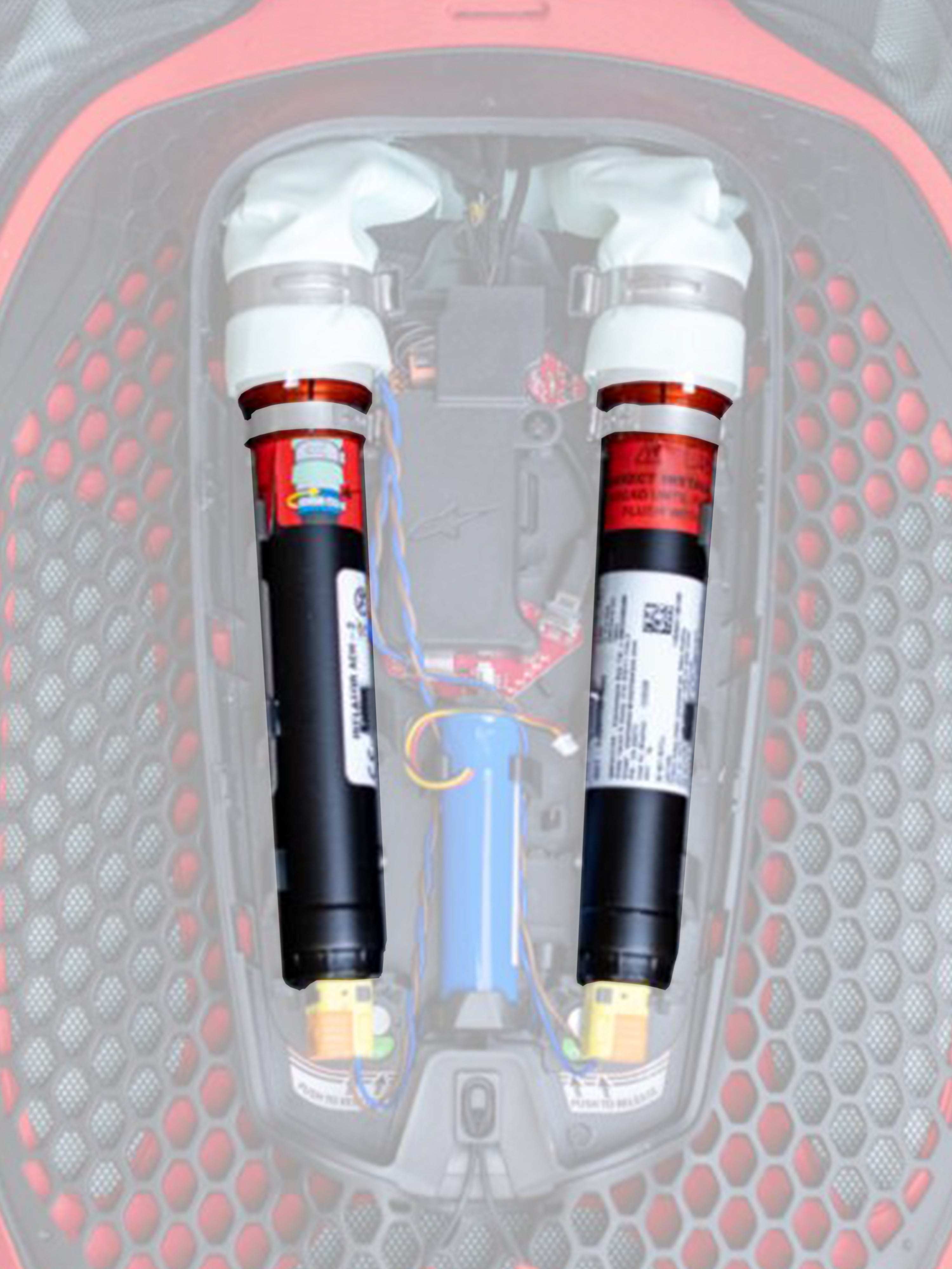 Alpinestars Tech-Air 7X & Off-Road Replacement Canister Kit, bombole di ricambio per airbag, nere con estremità bianche e bande arancioni, due bombole di argon installate in un sistema airbag elettronico con trama a nido d'ape rossa e nera e cablaggi colorati